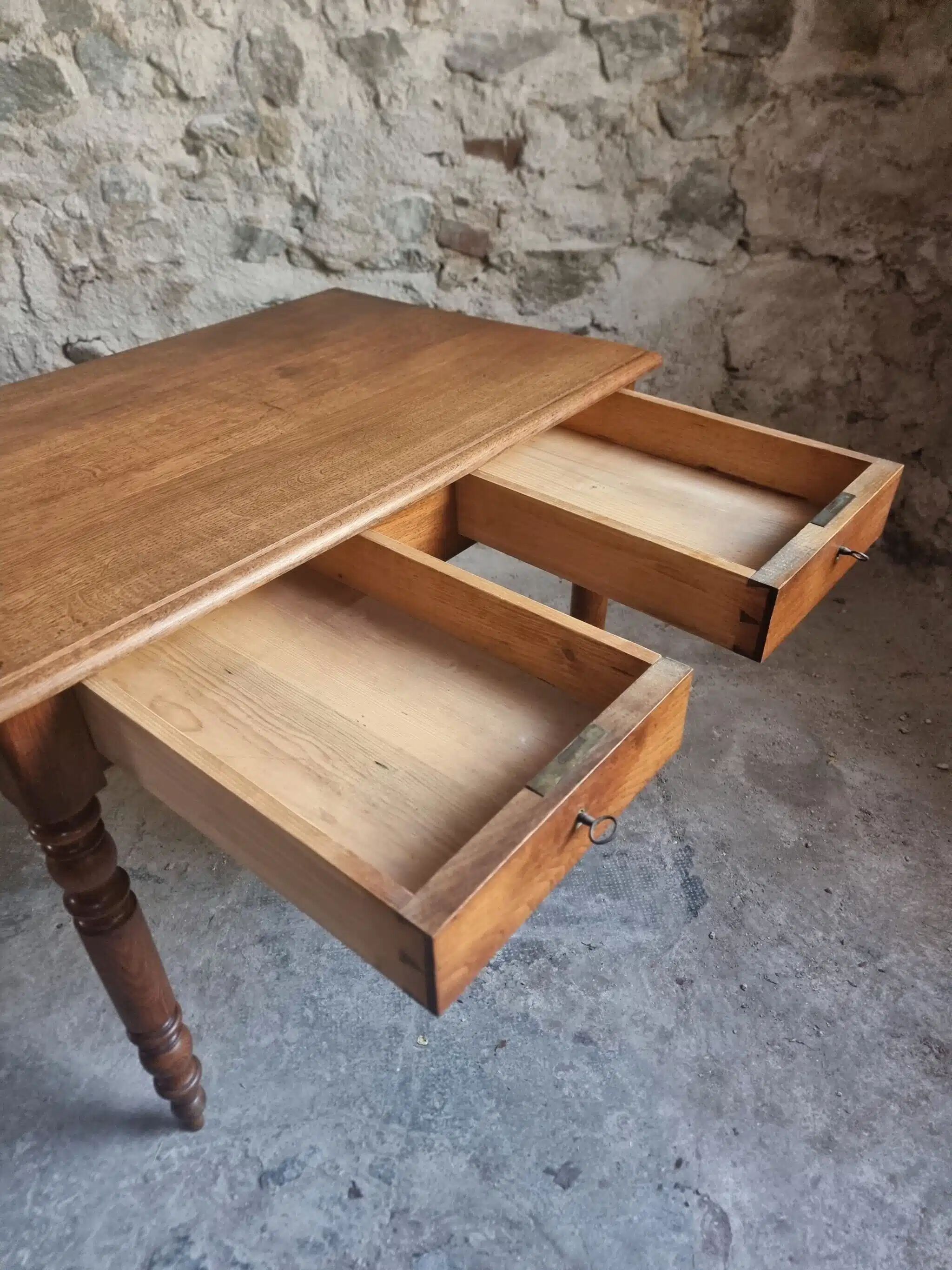 Antique French oak writing desk with 2 lockable drawers, circa 1920.