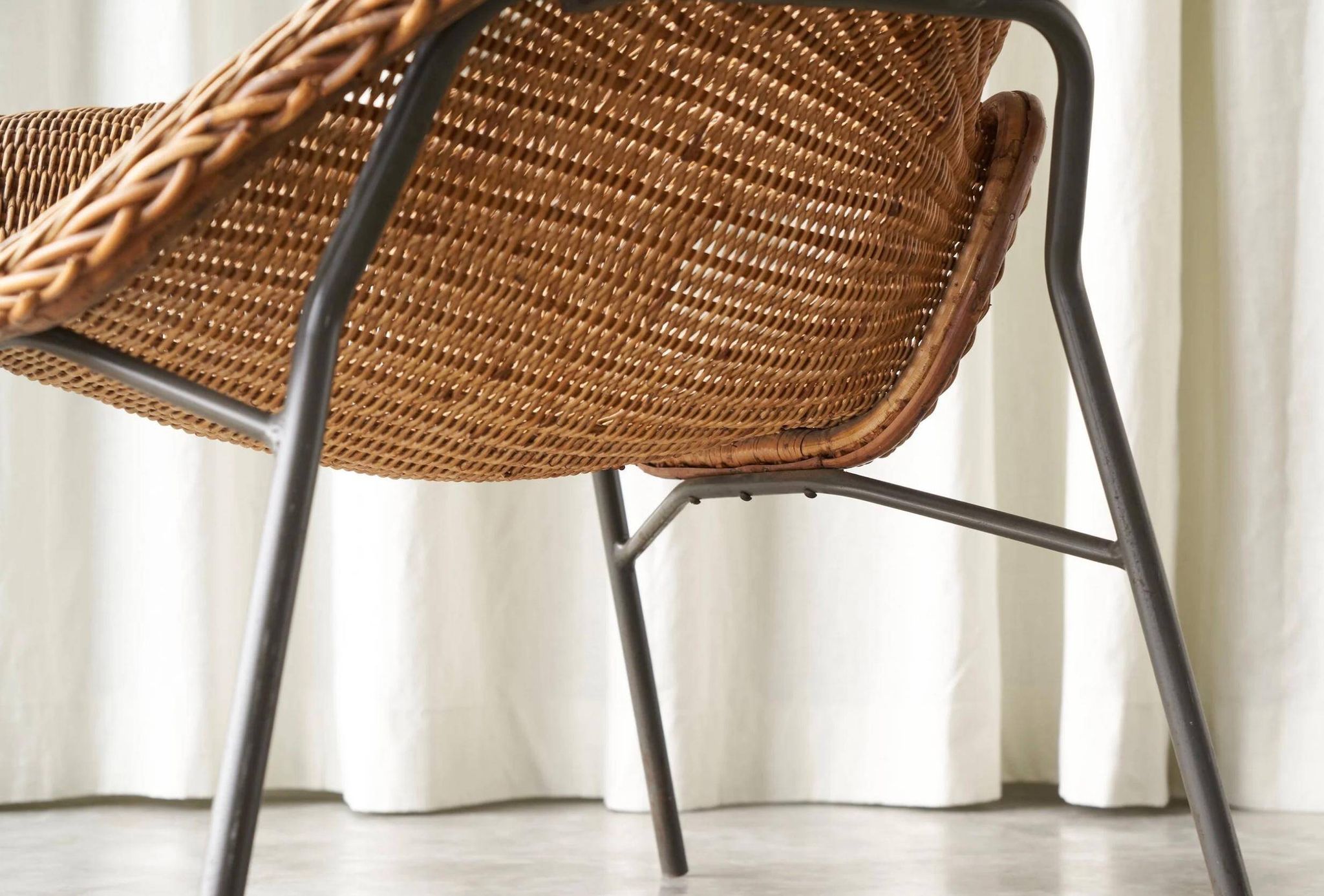 Sculptural lounge chair in rattan and metal, 1960s