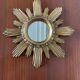 Vintage sun mirror in 60s/70s gold resin