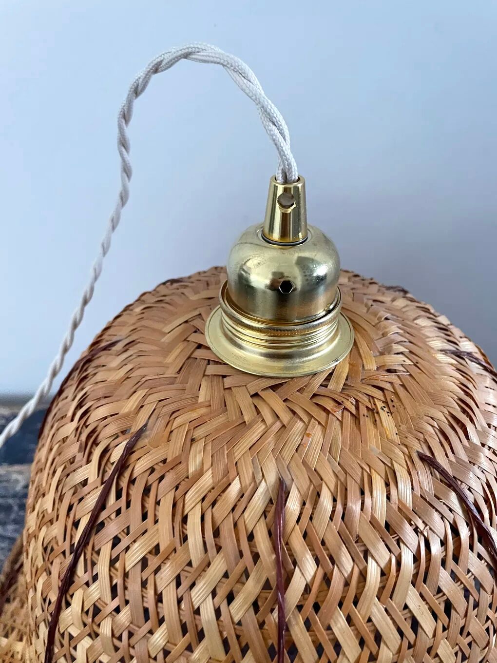 Vintage suspension in electrified braided wicker to nine