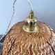 Vintage suspension in electrified braided wicker to nine