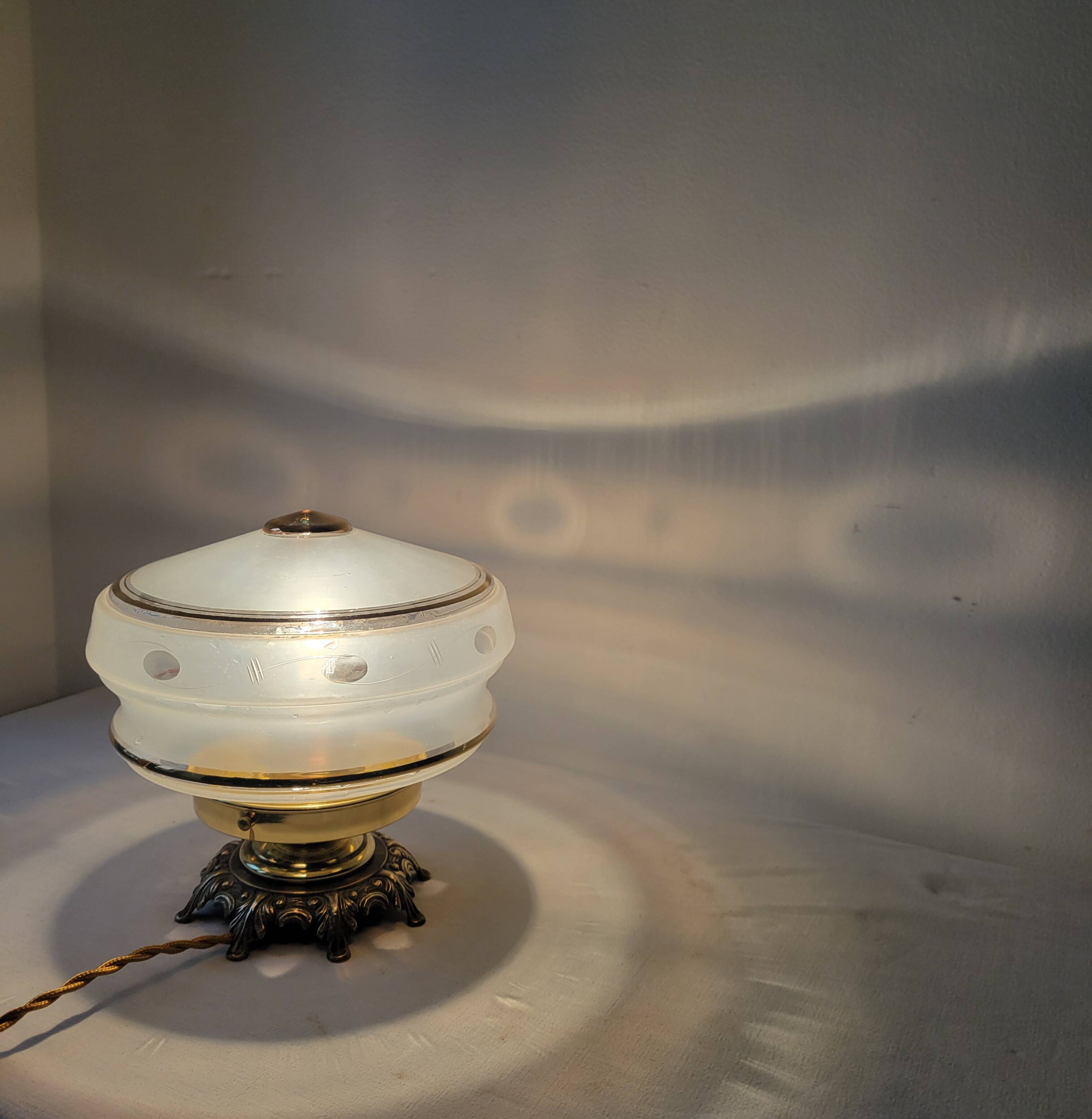 Brass and frosted glass lamp