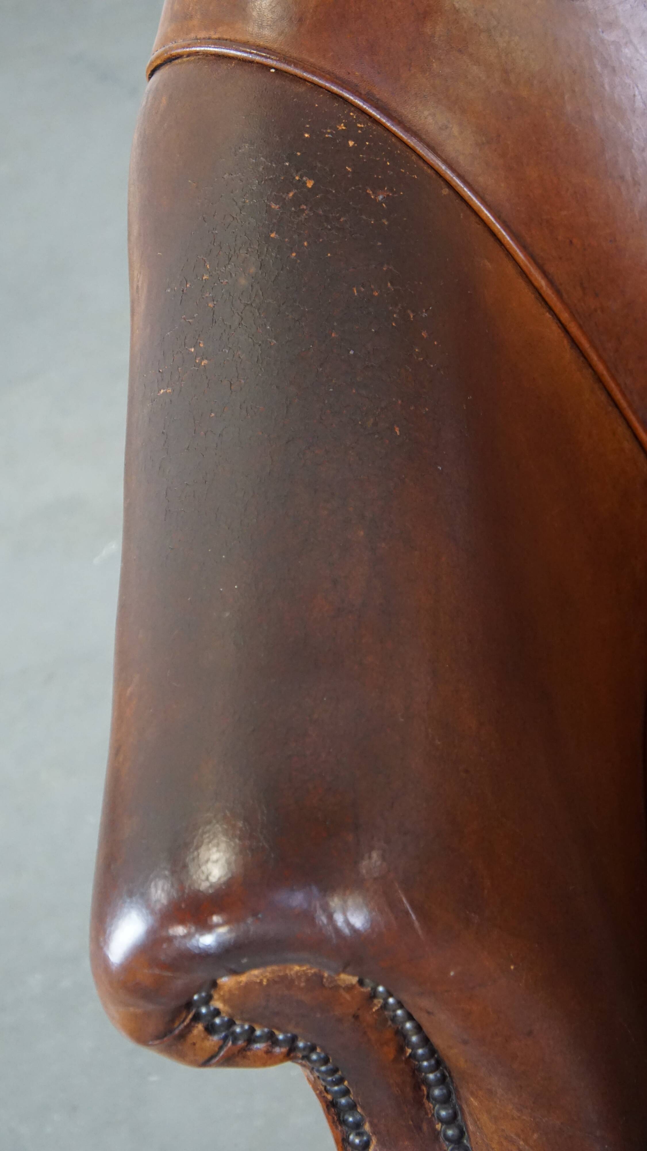 Vintage club armchair in sheepskin leather