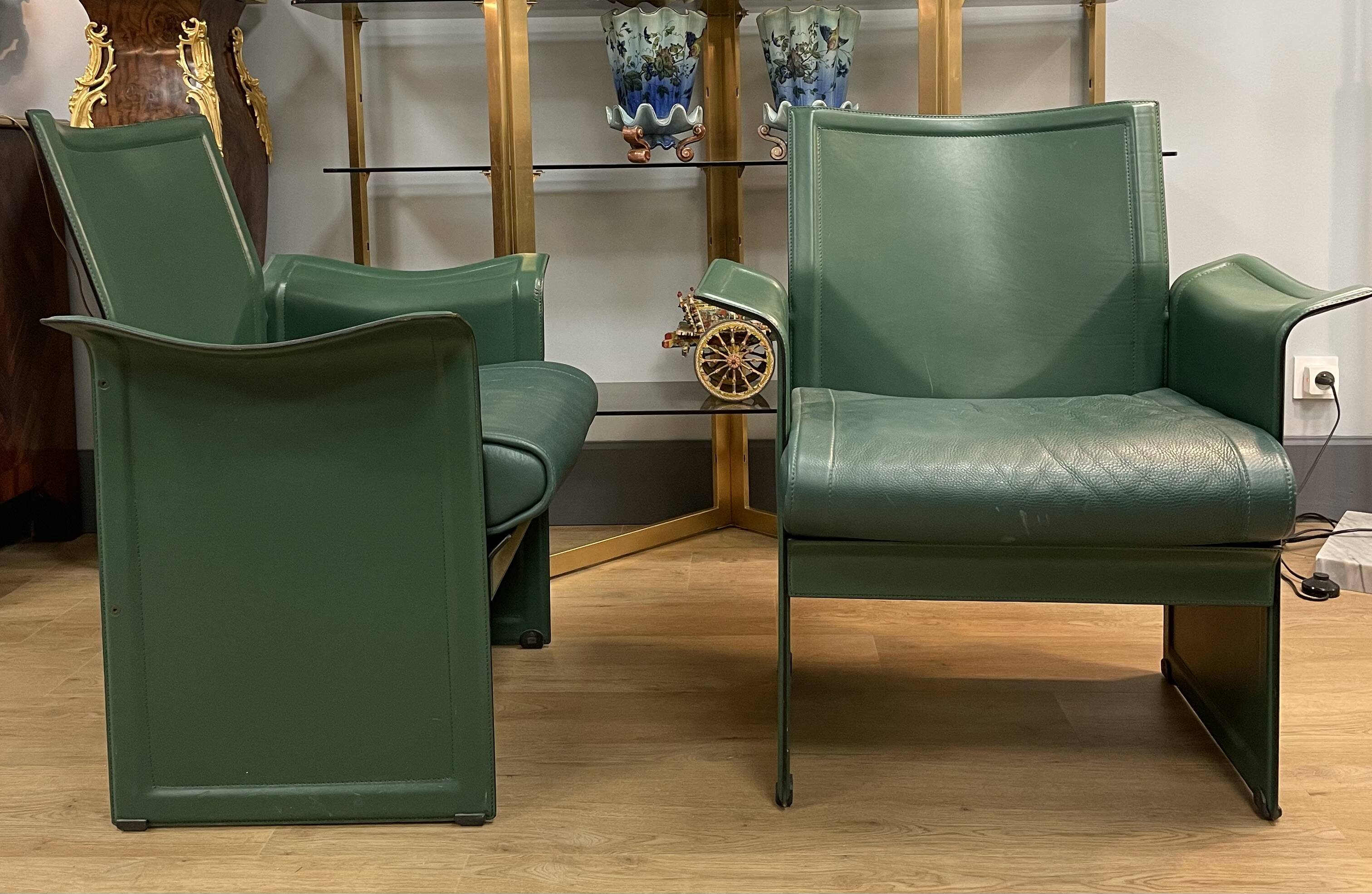 Pair of green leather armchairs from the 70s