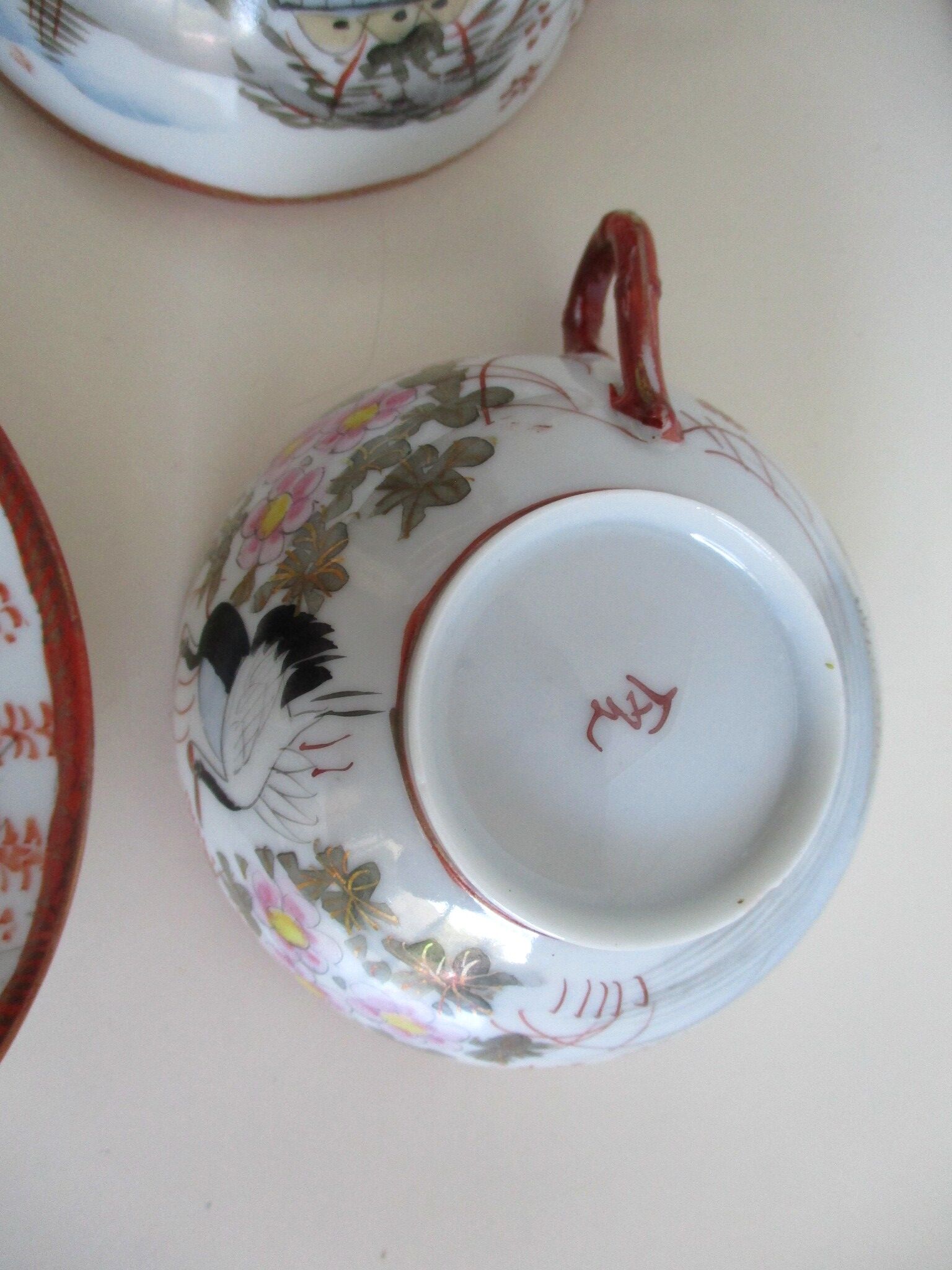 Antique cups and under cups porcelain japan
