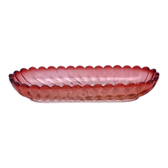 Elongated pink glass cup