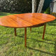 Extendable round table by Luigi Bartolini