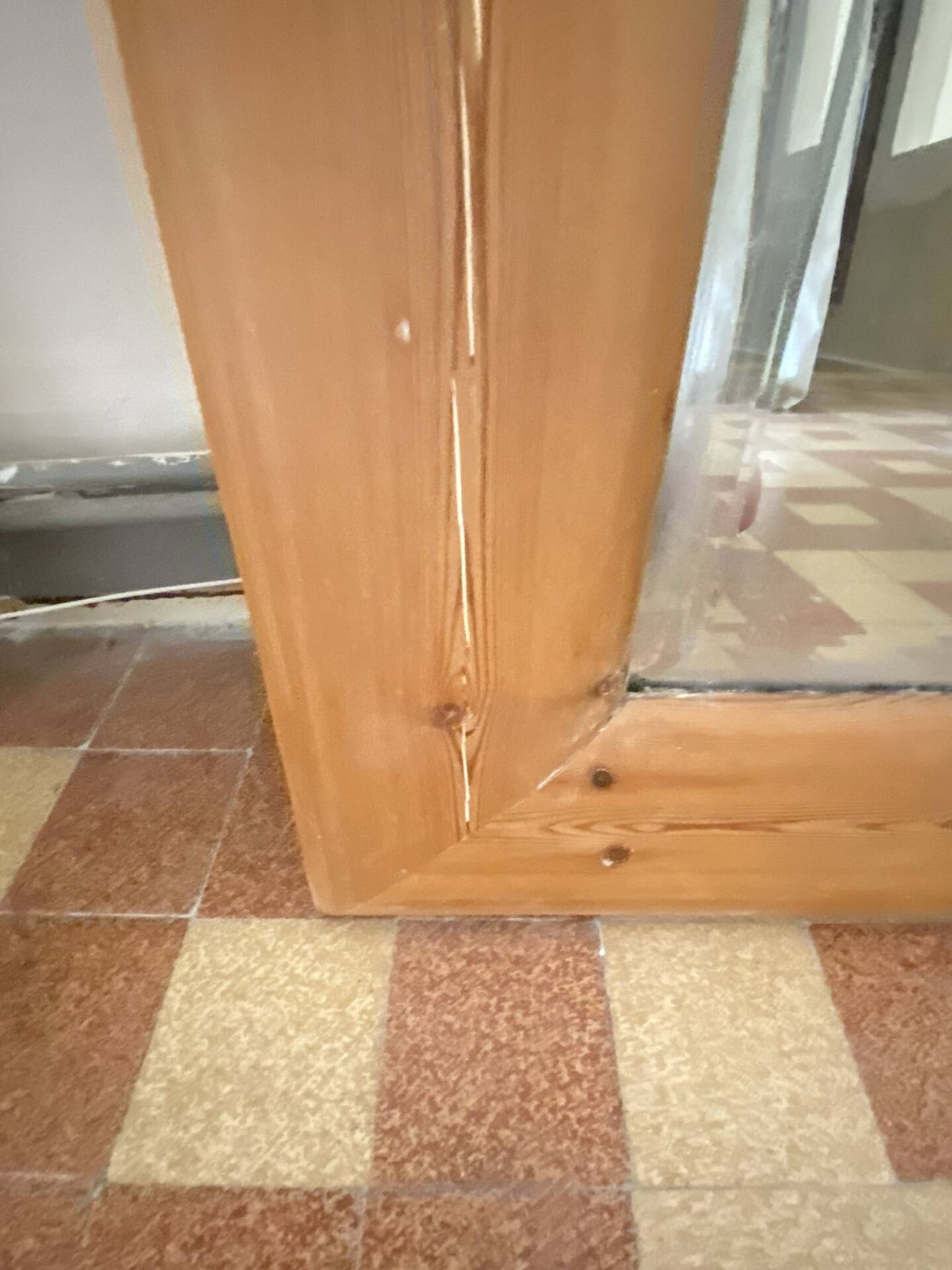 Very large mirror in antique pine.