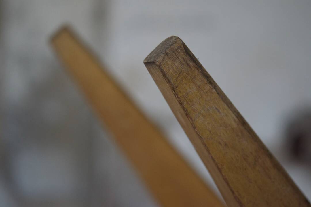 two  style wooden chairs