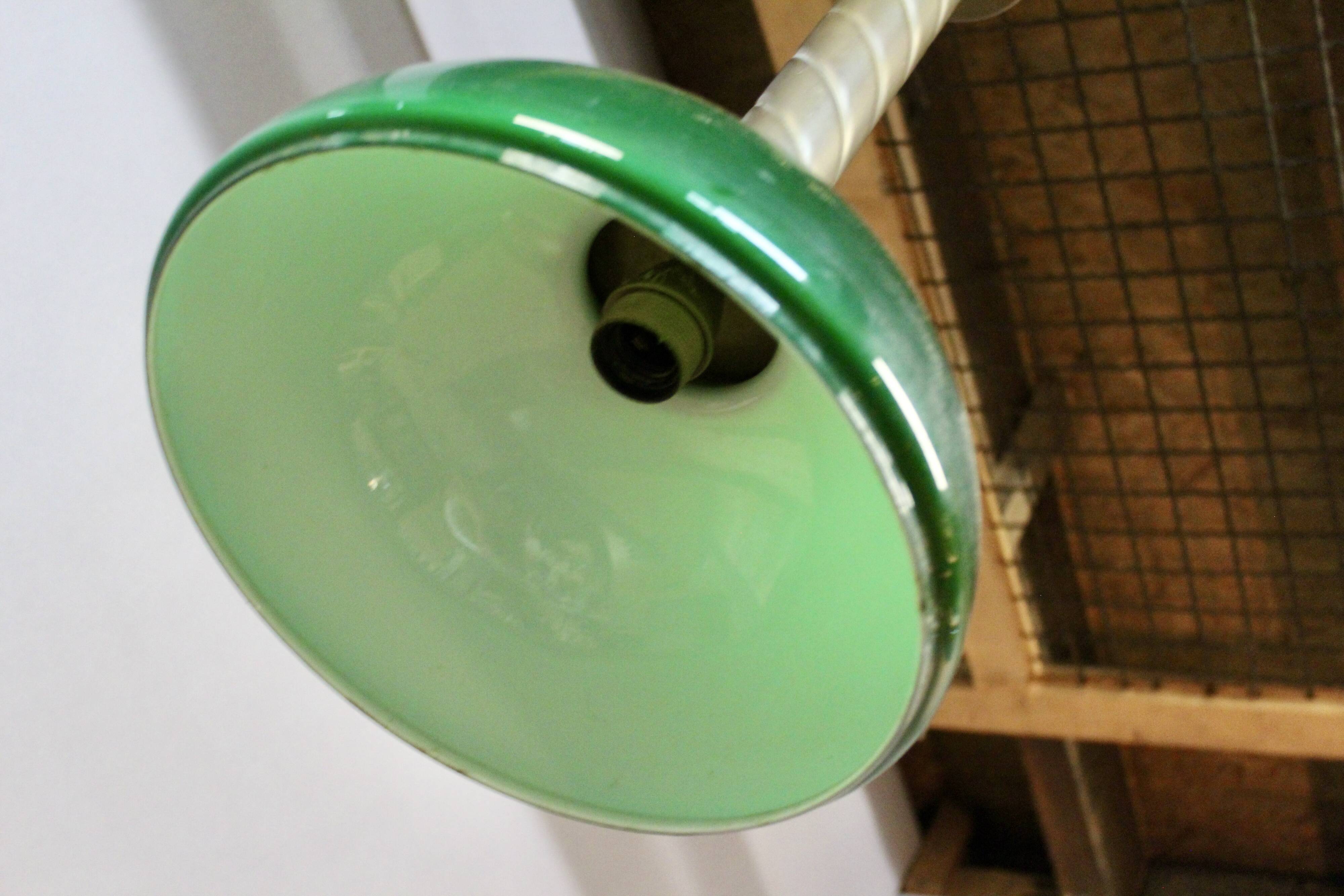 Chandelier with brass body and green opaline