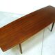 Curved Danish teak coffee table with additional shelf compartment, 1960s