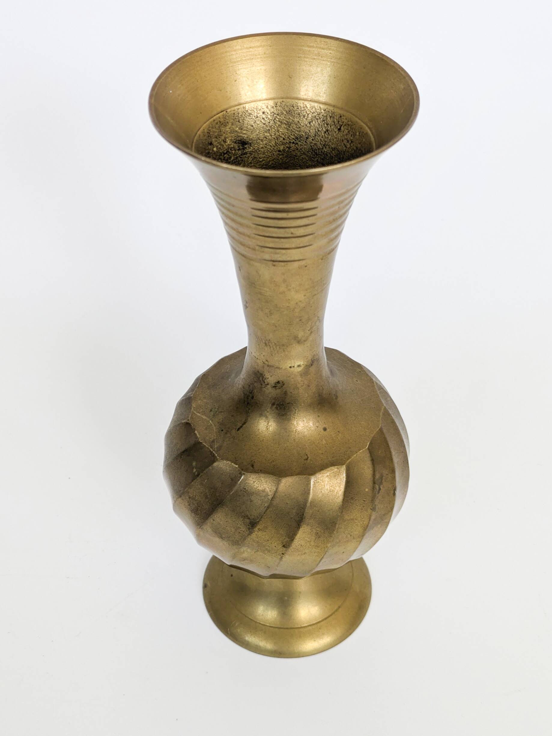 Solid brass Midcentury vase in trumpet shape with twisted details.