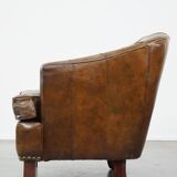 Stylish armchair made of cowhide leather with a unique design and beautiful finish