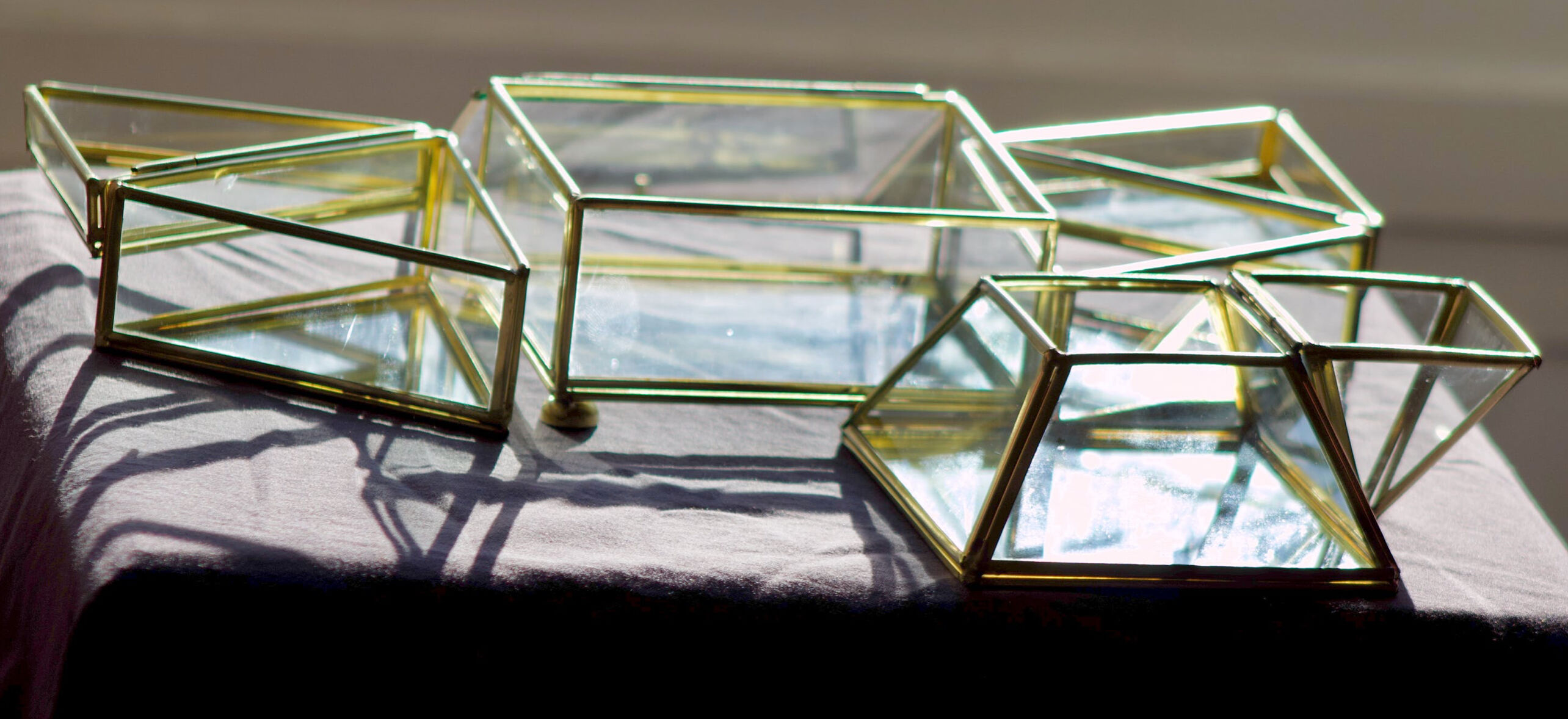 4 old glass, brass and mirror jewellery boxes