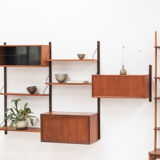 Playful 3-bay wall unit in teak wood by Poul Cadovius, Denmark, 1950s