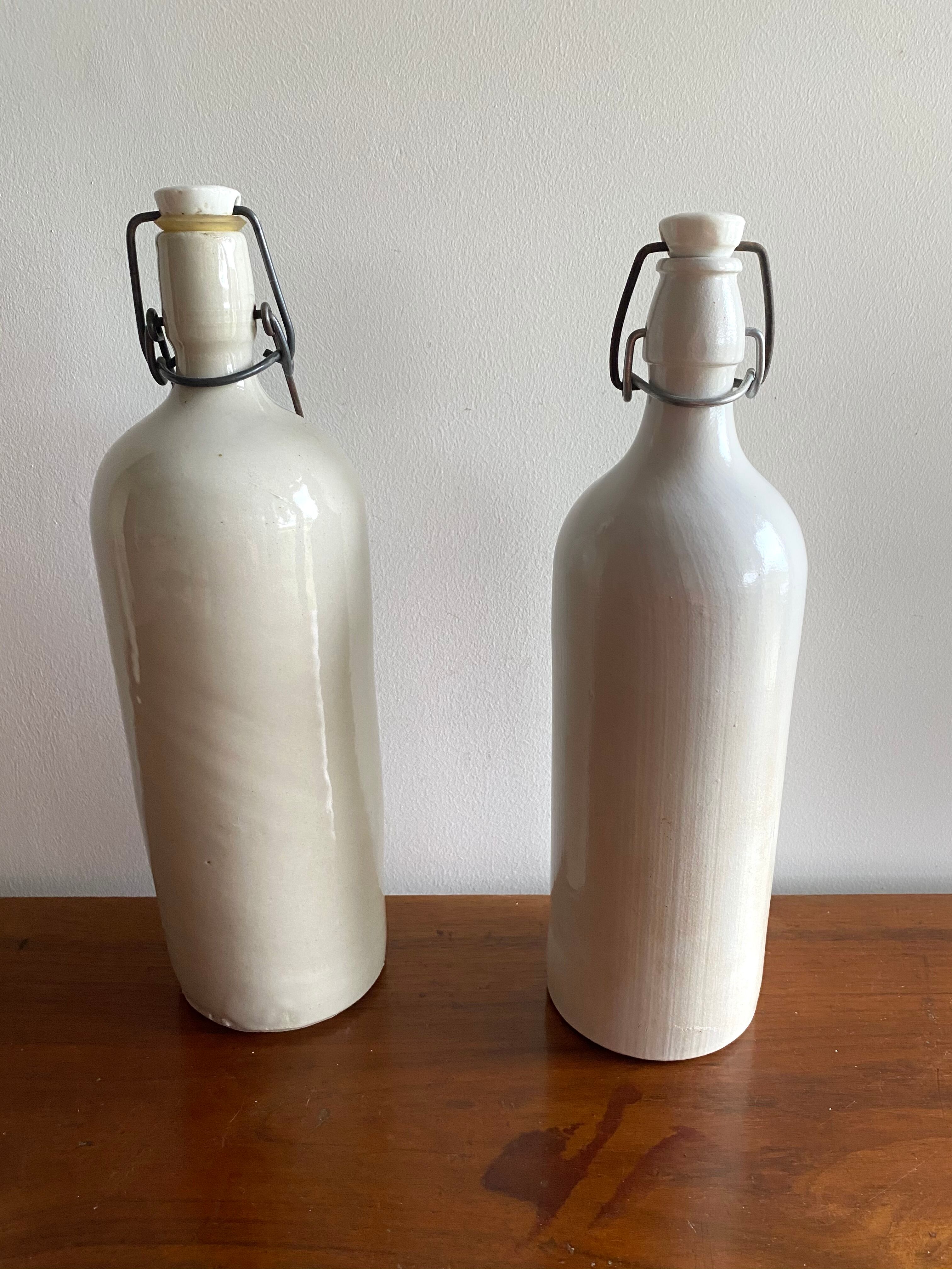Set of 2 old bottles in glazed stoneware