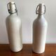 Set of 2 old bottles in glazed stoneware