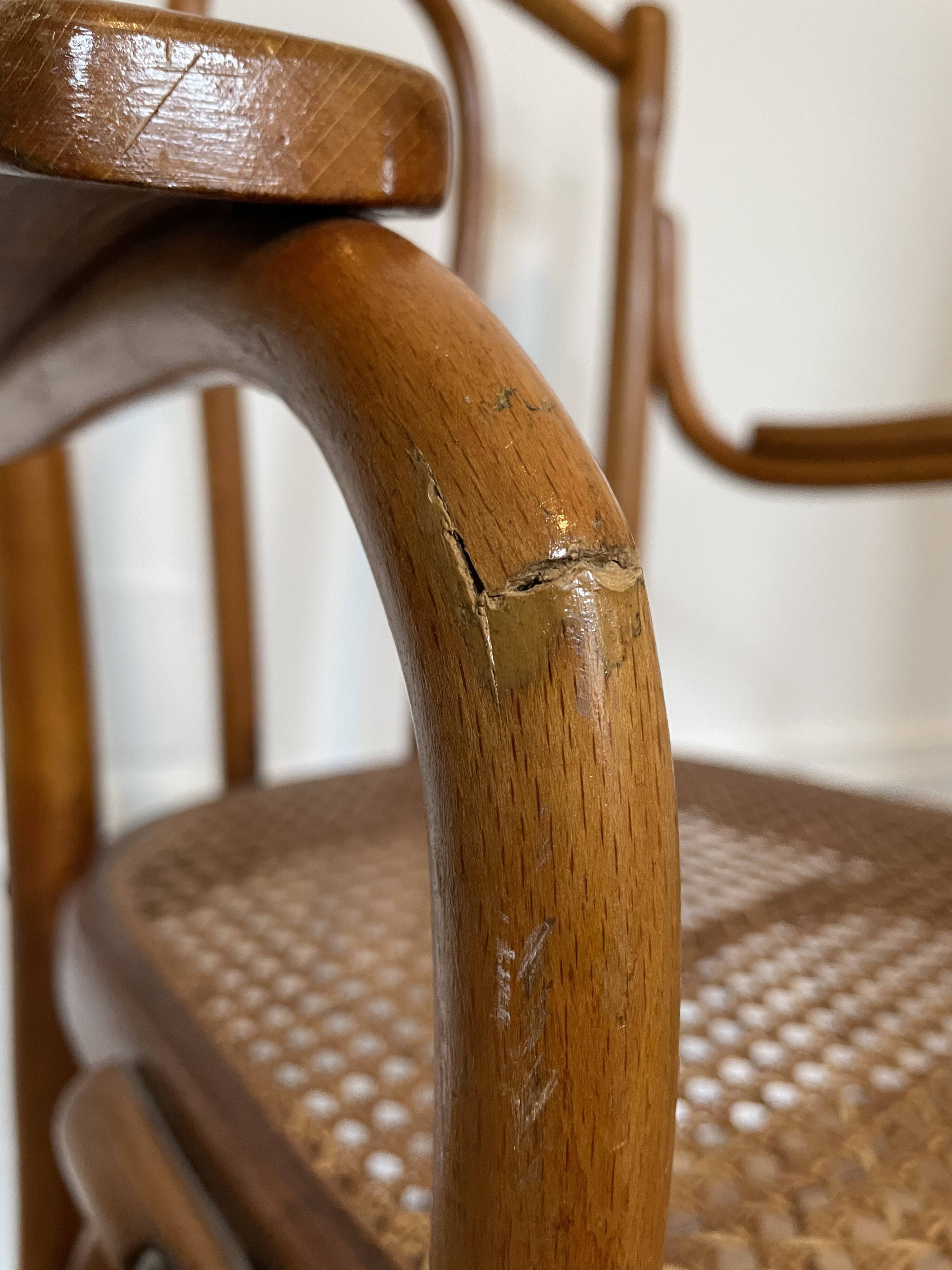 Old thonet armchair in curved wood and rattan cane