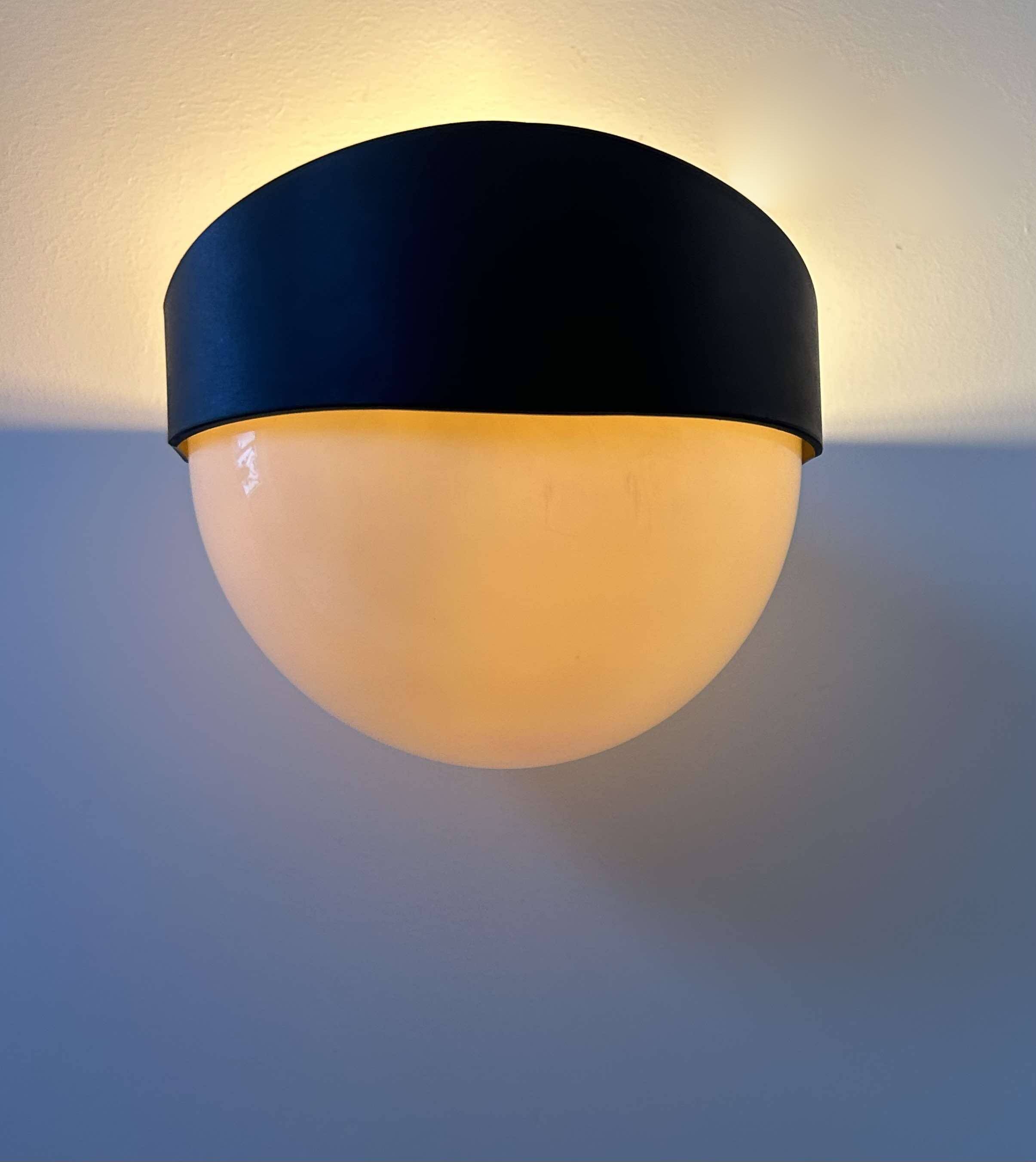 Pair of vintage wall lights, white and black Perspex, Sweden 1970