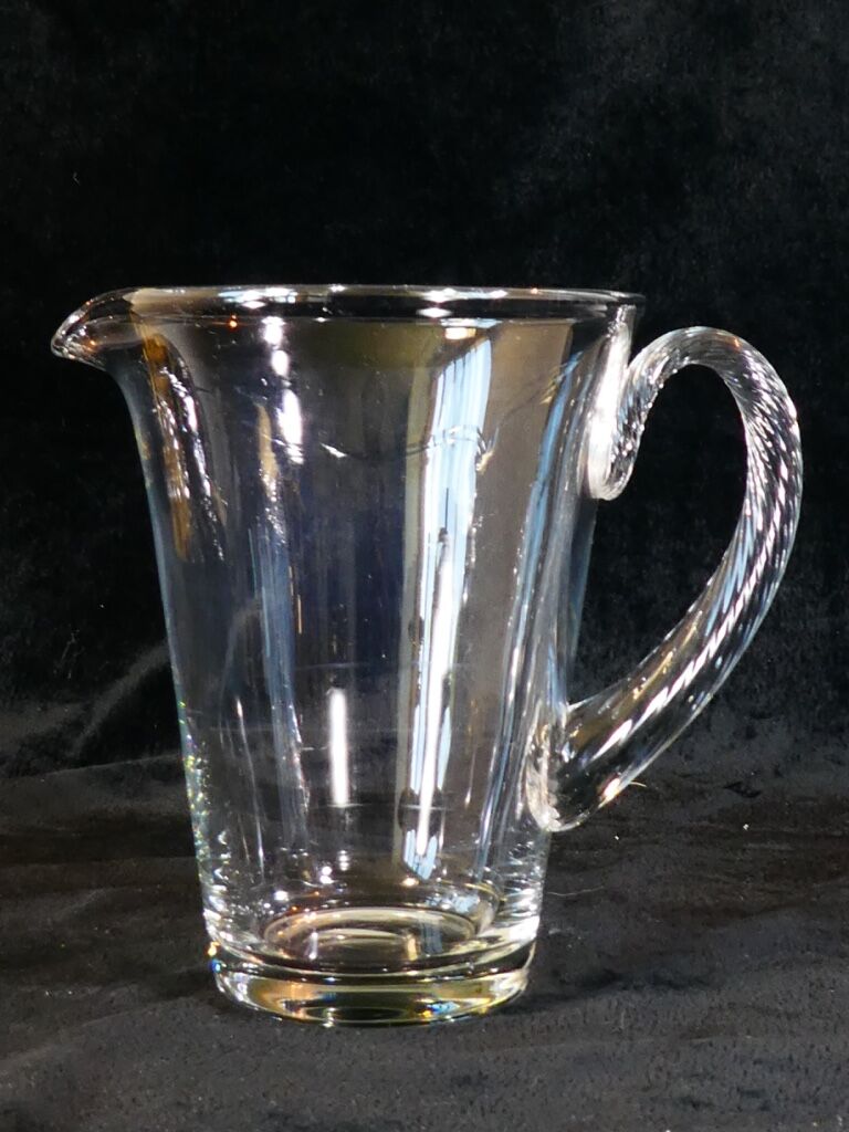 Pitcher Carafe has orangeade em blown glass