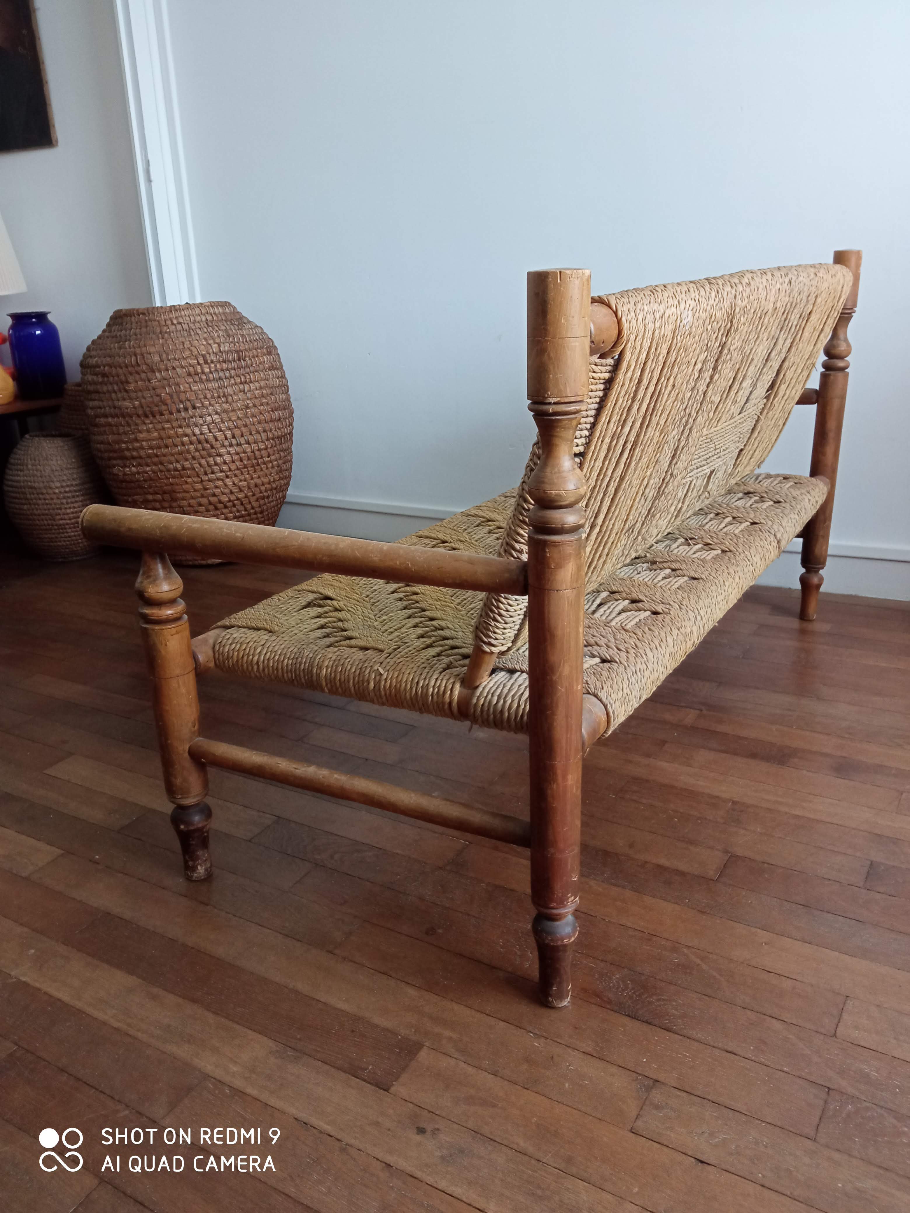 Wooden bench and rope around 1950