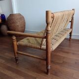 Wooden bench and rope around 1950