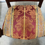 Pair of cross-back armchairs, Empire style, 19th century.