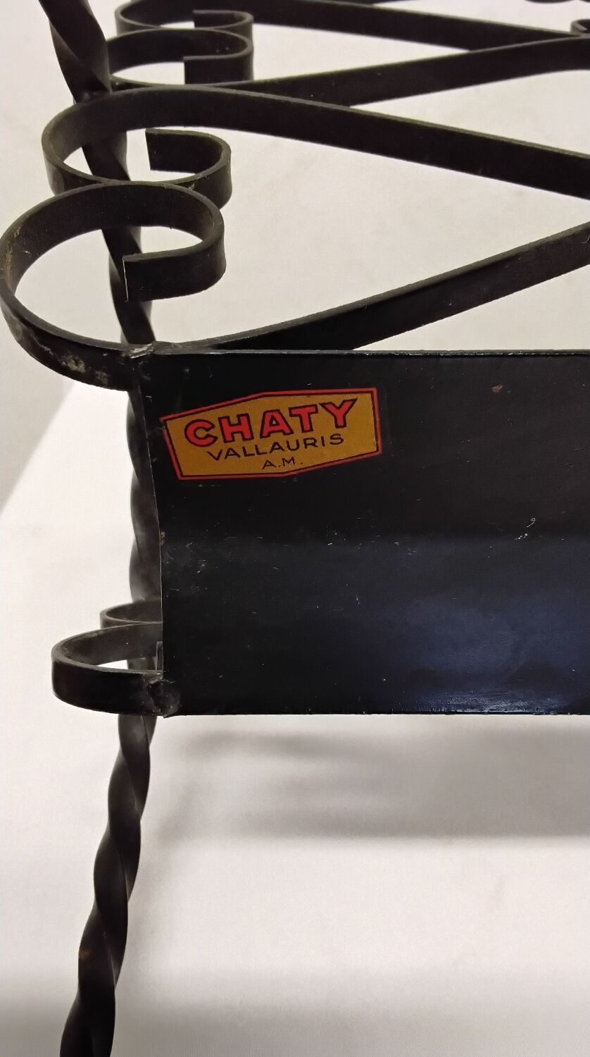 Wrought iron magazine rack signed CHATY Vallauris