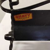 Wrought iron magazine rack signed CHATY Vallauris