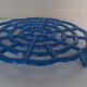 Old blue vintage enamelled table mat