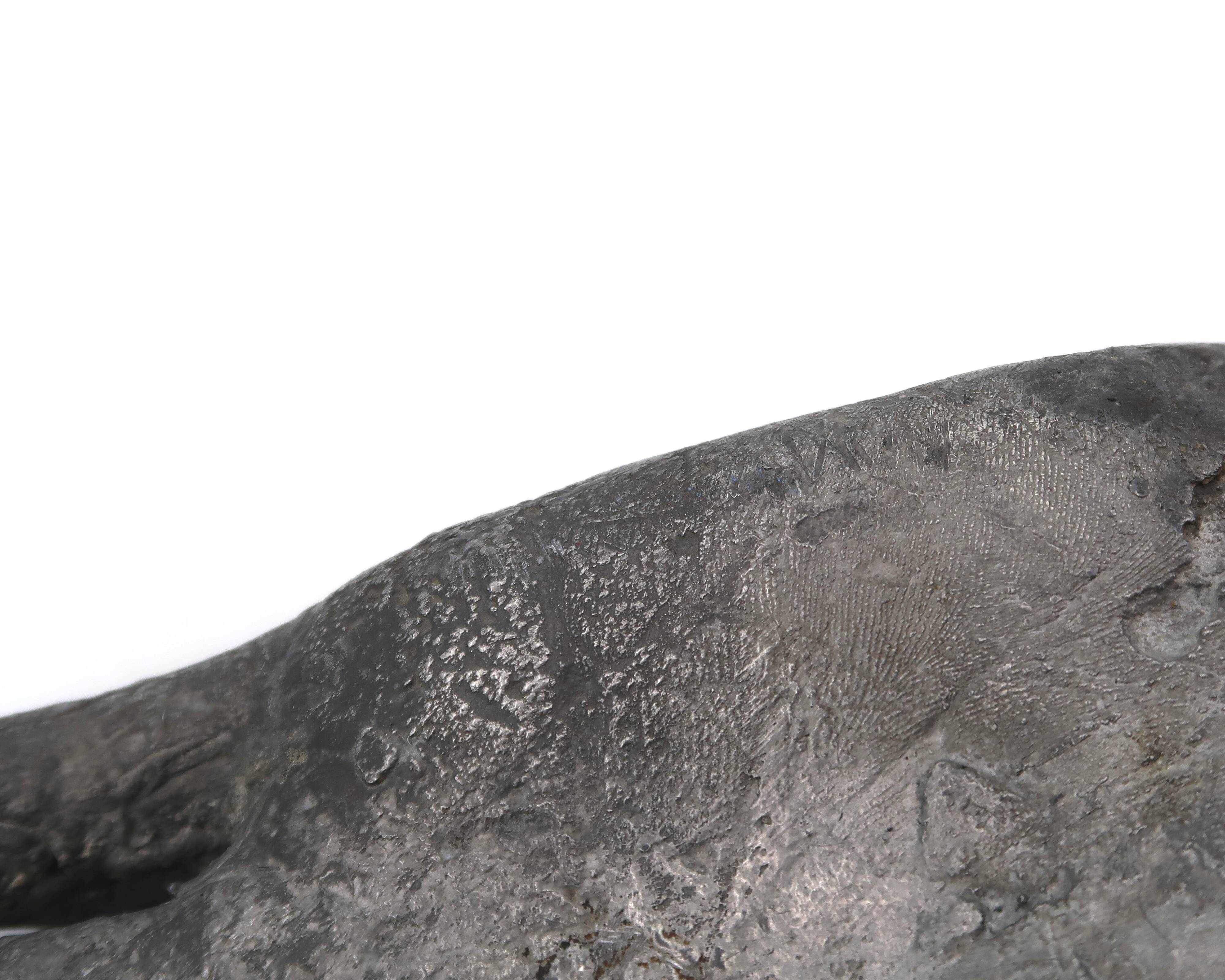 Cast iron silver-coloured catchall in the shape of a hand, 1970s sculpture.