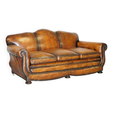 Restored vintage leather sofa from a gentleman's Victorian club.