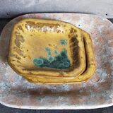 Set of three potter's plates in enamelled earth