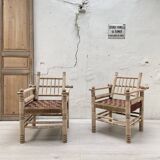 Pair of wooden armchairs and ropes
