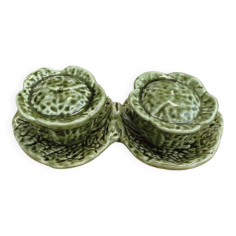 Salt and pepper shakers in the shape of a cabbage leaf.