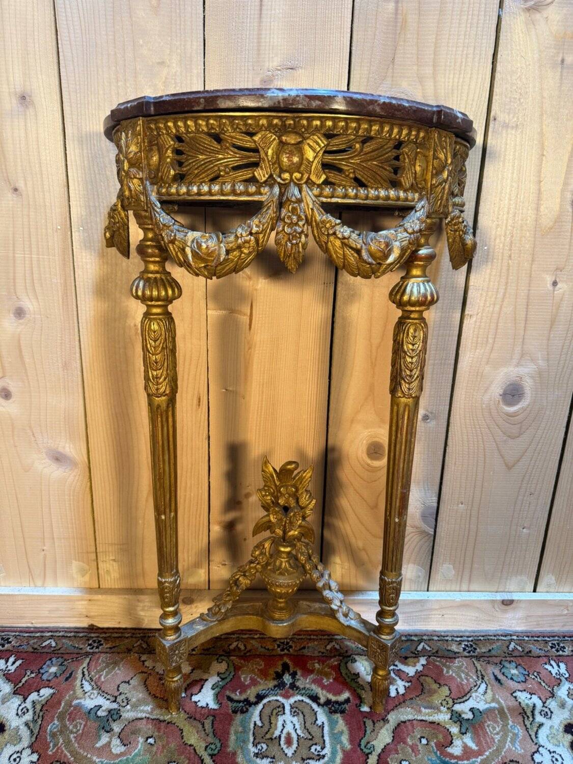 Louis XVI style console in gilded and carved wood