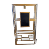 Kim MOLTZER illuminated bookcase in chromed metal.