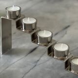 Chrome-plated metal candle holder