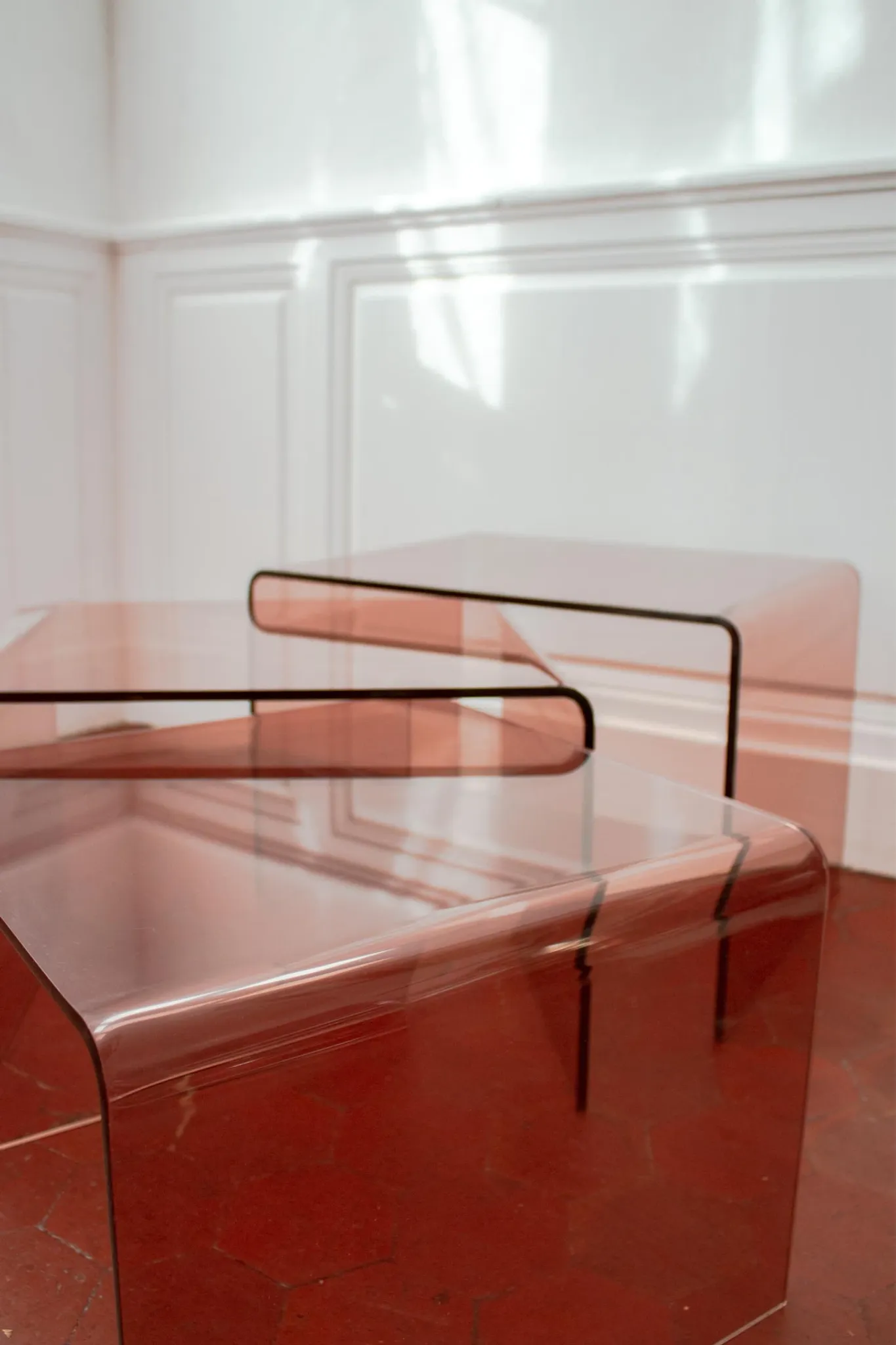 Vintage trio of nesting tables in smoked plexiglass by Michel Dumas, year