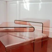 Vintage trio of nesting tables in smoked plexiglass by Michel Dumas, year
