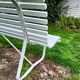 Antique garden bench with metal legs