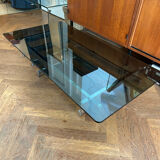 70s design coffee table in rectangular glass with chrome legs.
