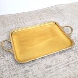 Old serving tray in gilded brass
