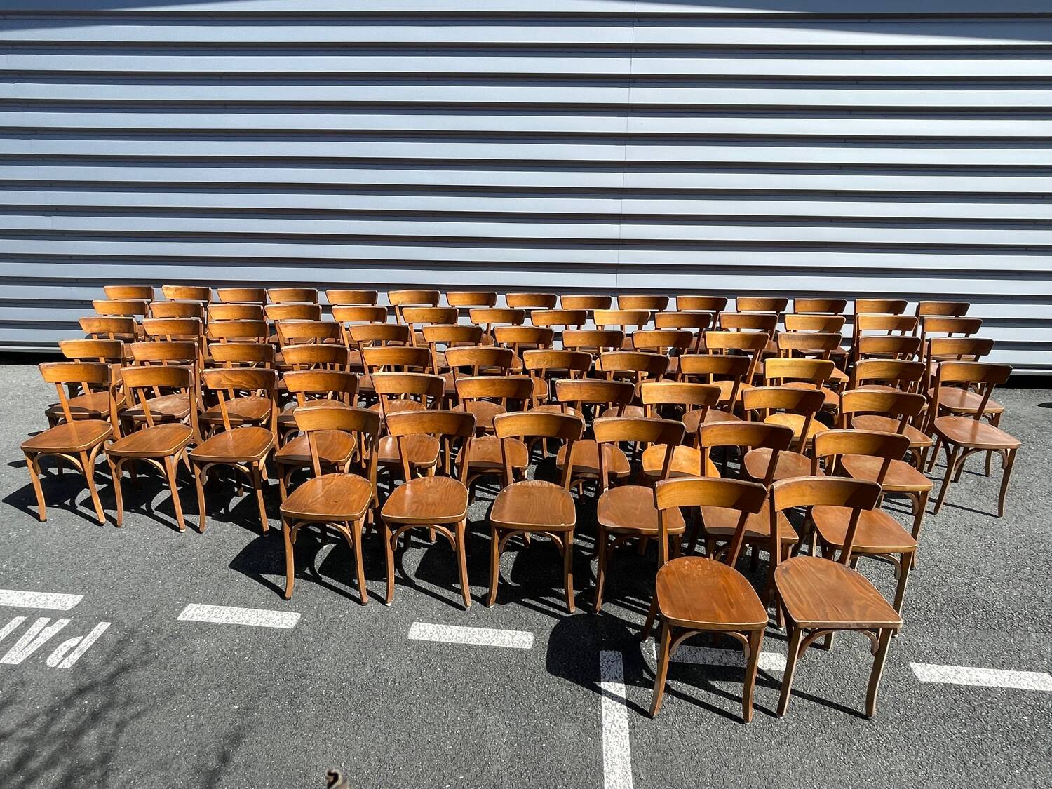 Lot of 60 wooden bistro chairs from the Baumann 1970s