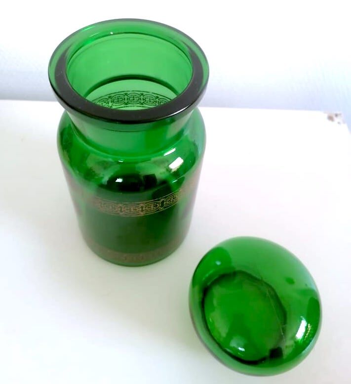 Apothecary jar in vintage green and gold glass