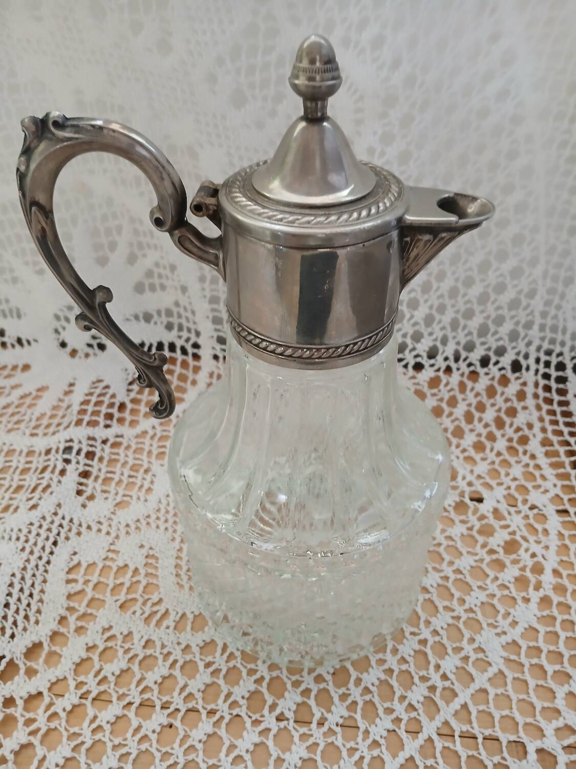 Antique pewter and glass carafe