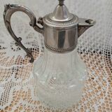 Antique pewter and glass carafe