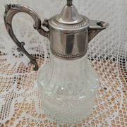 Antique pewter and glass carafe