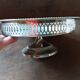 Old metal bowl on foot