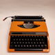 Vintage 70 orange Silver-Reed 100